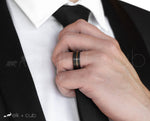 Man In Suit Wearing Tungsten Ring by Elk and Cub