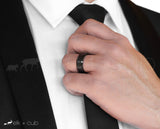 Man in Suit Wearing Titanium Ring