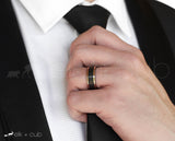 Man In Suit Wearing Tungsten Ring by Elk and Cub