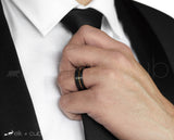 Man In Suit Wearing Tungsten Ring by Elk and Cub