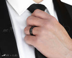 Man in Suit Wearing Titanium Ring