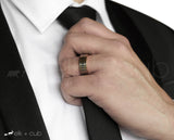 Man In Suit Wearing Tungsten Ring by Elk and Cub