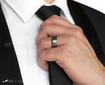 Man In Suit Wearing Tungsten Ring by Elk and Cub